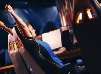side_view_of_a_young_excited_female_cybersport_gam_2023_11_27_05