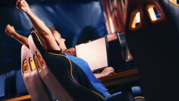 side_view_of_a_young_excited_female_cybersport_gam_2023_11_27_05